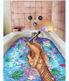 a woman laying in a bathtub with her legs crossed