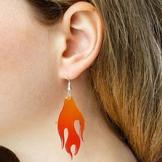 Ignite your style with our eye-popping BUNNYBOOP Y2K Red Flame Acrylic Earrings! These aren't just earrings; they're conversation starters, designed to add a spark of joy and a blaze of personality to any look. Made with dazzling love and fiery passion, each piece is a vibrant red flame, crafted from the highest quality acrylic for a lightweight, comfortable wear all day long. Dive deep into the playful side of the millennium with these funky and funny earrings that scream uniqueness. Ideal for Trendy Red Jewelry For Halloween, Trendy Red Halloween Jewelry, Fun Red Jewelry For Halloween, Red Fun Halloween Jewelry, Fun Red Halloween Jewelry, Trendy Halloween Earrings, Earrings Stand, Funny Earrings, Quirky Earrings