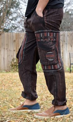 a person standing in the grass with their shoes on