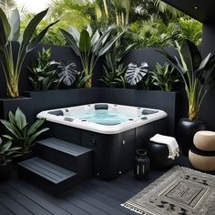 a hot tub sitting on top of a wooden deck next to potted plants and greenery