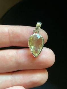 This small inverted teardrop pendant is handmade with genuine Oregon Sunstone in solid Sterling Silver and features a rose cut. Sunstone is the state gem of Oregon, found only in a small area near Plush, OR. Sunstones are feldspar crystals in the Labradorite/Moonstone family that formed millions of years ago in very small pockets in lava rock. Relatively speaking this is a large piece, as these special little crystals are very rare!  Oregon Sunstone can have different color play, from green to r Silver Teardrop Gemstones, Teardrop Faceted Citrine Jewelry, Faceted Teardrop Citrine Jewelry, Teardrop Citrine Gemstone Jewelry, Yellow Faceted Teardrop Jewelry, Citrine Teardrop Pendant Jewelry, Citrine Drop Gemstone Jewelry, Silver Teardrop Citrine Jewelry, Faceted Citrine Drop Jewelry