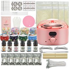 the contents of an electric rice cooker and other kitchen accessories including utensils