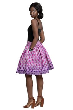 Our Ebele African print skirt is the perfect skirt of the spring and summer season. Light and airy two-tone knee-length pleated skirt. Pink to mauve. Made out of material mixed with cotton and polyester. It is uniquely soft, sexy and guaranteed to make you stand out on your next outing. Wear it with any top, crop top. Matching crop tops available in our store. Description: Zipper and clip on the back Knee to above knee length pleated skirt Fully lined Softly made with light and airy African- Ori Ankara Shirt Dress, African Print Midi Skirt, Skirt African Print, Ankara Shirt, African Print Skirt, Ankara Skirt, African Clothing For Men, Printed Midi Skirt, Skirt Midi