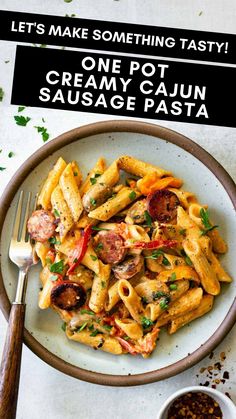 a white plate topped with pasta and sausage