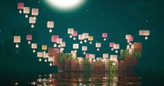 many paper lanterns floating in the air over water