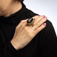 Elaborate vintage large poison or pillbox ring (circa 1950s to 1960s), crafted in 14 karat yellow gold.   Turquoise totals an estimated 0.90 carats & is set upon an onyx mounting that measures 25mm x 17mm. The stones are in excellent condition and free of cracks or crisps.     The ring opens to reveal a secret compartment. Typically this type of ring has been used to carry perfume, locks of hair, devotional relics, messages or other keepsakes.   The substantial ring weighs 35.7 grammes, with a h Pillbox Ring, Poison Ring, Secret Compartment, Onyx Jewelry, Best Wear, Pill Boxes, Types Of Rings, Ring Vintage, Vintage Rings