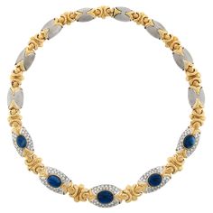 Here we have a breathtaking and very well made necklace that is crafted from solid 18k yellow and white gold. The necklace features fine oval cabochon cut sapphires, of which two have been randomly selected for testing by GIA, and are neatly bezel set throughout the center of the chain with largest at its center. These gorgeous and large stones total approximately 34 carats in weight and are well matched showing an amazing royal blue color that brings such a rich look to this bold necklace. The sapphires are each surrounded by very fine diamonds that are perfectly pave, adding approximately 4 carats to the total weight, and display truly outstanding brilliance with rich amount of sparkle for a super glamorous look.The remaining fancy links are constructed from matte finish white gold and h Bold Necklace, Royal Blue Color, Oval Cabochon, Link Necklace, Gold Material, Bezel Setting, Pave Diamonds, Royal Blue, Sapphire