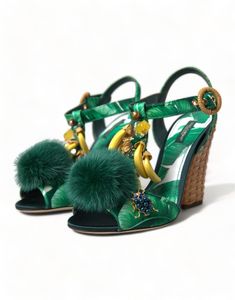 Step into luxury with these exquisite T-Strap Sandals by Dolce & Gabbana. Crafted with a blend of silk and fine mink fur, these shoes feature a captivating banana motif adorned with crystals. The perfect blend of glamour and comfort, these green sandals are a testament to Italian craftsmanship and luxurious style. Material: 90% Silk, 5% Paglia, 5% Visone Sole: Leather Color: Green Logo Details Country of origin: Italy 2024 Shoes, Green Sandals, Green Banana, Dolce Gabbana Shoes, Italian Shoes, Green Logo, Dolce E Gabbana, Green Crystal, T Strap Sandals