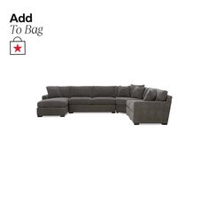 a large sectional couch with pillows on the back and side ends, sitting in front of a white background