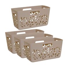 three white plastic baskets with cutouts on the sides and handles, one is empty