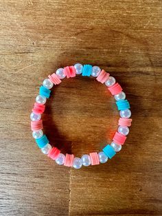 summer vibes clay bead bracelet with blue pearl and coral beads Bracelet Ideas Pink, Clay Bead Bracelet Ideas, Bead Bracelet Ideas, Sea Beads, Kids Bead Bracelet, Preppy Bracelets, Beads Pattern, Clay Bead Bracelet, Bracelets Ideas