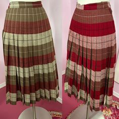 "Vintage 1950s wool pleated tartan plaid in burgundy , off white, brown and black. Skirt has reversible shadow print. Side metal zipper. There are a few pinholes from moths, nothing noticeable. Excellent Condition Overall  Label: None Fits Medium Measurements are  Waist 28\" Hips 40\" Length 25.75\" Sweep 156\"" Retro Plaid Pleated Skirt For Fall, Retro Accordion Pleated Skirt For Fall, Vintage Plaid Pleated Skirt For Fall, 1970s Outfits, Plaid Wool Skirt, Taffeta Skirt, Black Floral Maxi Dress, Reversible Skirt, Vintage Dress 70s