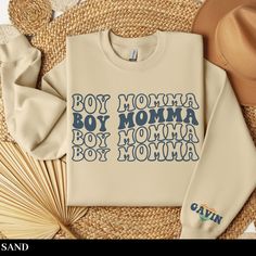 "Wrap yourself in cozy comfort and celebrate motherhood with our custom Boy Mom sweatshirt, the perfect personalized gift for first-time or expecting moms. An ideal postpartum or Mother's Day treat, this sweatshirt is designed for you to embrace the \"Boy Mom Era\" in style. SIZING -If you are looking for an over-sized look please size up 1-3 sizes from what you normally wear. -Please see sizing chart -These are unisex shirts, this means they will have a loose fit **I do not accept returns or exchanges due to sizing issues - please reference sizing chart in product images prior to purchase PRINT COLOR & SIZING -Please be aware, the color of the print in the shirt may vary slightly from what you see on your screen due to differences in display types. Apparel is made to order using Direct to Casual Sweatshirt With Custom Text For Mother's Day, Casual Letter Print Sweatshirt For Gender Reveal, Cotton Letter Print Sweatshirt For Gender Reveal, Boy Mom Sweatshirt, First Time Mom, Mom Era, First Time Moms, Mom Sweatshirt, My Boy