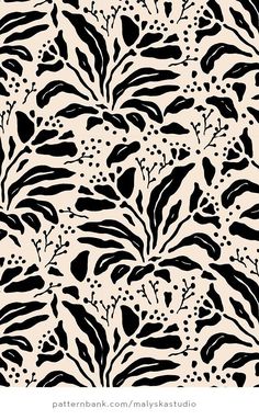 a black and white floral pattern on a beige background