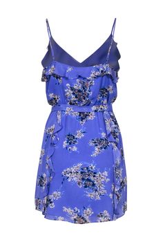 You'll be fashionable in florals in this dress by Joie! Featuring a surplice neckline detail, this cute little frock is sure to stand out among your other spring dresses. Pair with wedges for a cocktail party, or wear with sandals and a jean jacket for a casual daytime look. Size M Shell: 100% Silk Lining: 100% Polyester Slip on Elastic waistband Surplice neckline Fit and flare silhouette Sleeveless Ruffle details Adjustable shoulder straps Bust 32" Waist 25" Shoulder to hem 34" Spring V-neck Printed Sleeveless Dress, Spring Printed V-neck Sleeveless Dress, Printed V-neck Sleeveless Dress For Spring, Spring Sleeveless V-neck Dress With Print, Flirty Ruffled Dress With Surplice Neckline, Flowy Floral Print Sleeveless Sundress, Blue Floral Print Mini Sleeveless Dress, Purple Floral Sleeveless Dress For The Beach, Spring V-neck Sleeveless Dress With Ruffles