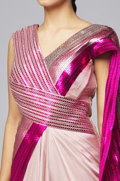 Blush, fuchsia draped gown with metallic stripes, V neckline and overlap panel.
Component: 1
Pattern: Embroidered
Type Of Work: Striped
Neckline: V Neck
Sleeve Type: Sleeveless
Fabric: Chiffon
Color: Fuchsia,Pink
Other Details: 
Metallic stripes
Saree style drape
Occasion: Party,Cocktail - Aza Fashions Amit Aggarwal, Draped Gown, Saree Style, Drape Gowns, Gown For Women, Color Fuchsia, Gowns Online, Fuchsia Pink, Saree Styles