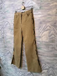 "Baggy Corduroy Pants Corduroy Trousers Boyfriend Pants Brown Sand Corduroy Pants Cowboy style pants Small Size Pants Label size: W32 ; L27 Measurements: (lying flat): Waist: 14\"- 35 cm Hips: 19\"- 48 cm Pant leg inseam: 31,5\" - 80cm Length: 41,5\" - 105 cm Please check measurements to insure a proper fit. Remember to allow yourself some extra room for movement. You can compare these with something from your closet that fits you well. This pants will come to you freshly laundered and ready to Casual Velvet Bottoms For Spring, Beige Straight Leg Corduroy Bottoms, Vintage Corduroy Pants For Spring, Trendy Straight Leg Corduroy Pants, Beige Straight Leg Corduroy Pants, Vintage Corduroy Straight Leg Bottoms, Vintage Straight Leg Corduroy Bottoms, Vintage Straight Leg Corduroy Pants, Vintage Corduroy Trousers