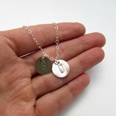 Your name is known. This necklace signifies the importance of each one you love. Each initial, each person is known and important.  You choose chain style: sterling silver or 14k gold filled 1.7mm cable chain (durable and will not easily break)Discs measure 11mm. Stamping is done by hand, so please allow for variation. Sterling Silver Initial Necklace, Silver Initial Necklace, Personalized Gold Necklace, Initial Necklace Silver, Gold Initial Necklace, Special Gifts For Mom, Sterling Silver Initial, Dangle Hoop Earrings, Initial Necklace Gold