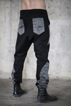 Modern Streetwear Pants With Side Pockets, Modern Black Pants With Pockets, Modern Cargo Pants For Streetwear, Urban Black Pants For Alternative Fashion, Black Hip Hop Pants For Alternative Fashion, Urban Cargo Pants For Alternative Fashion, Alternative Style Black Pants With Side Pockets, Post Apocalyptic Fashion, Apocalyptic Fashion