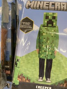 an image of a man in a minecraft costume on display at a toy store