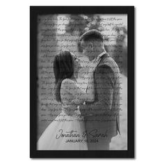 a black and white photo of a couple kissing in front of the words of their wedding vows