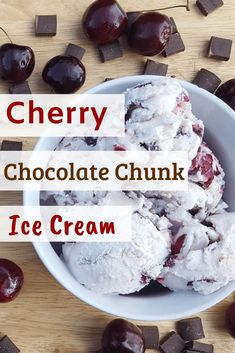 cherry chocolate chunk ice cream in a bowl with cherries around it on a wooden table