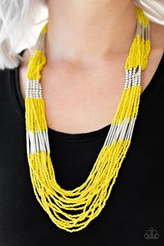 Countless strands of yellow seed beads drape across the chest in a layered cascade. Accented with classic silver beading, glassy cylindrical beading is added to the display for a radiant finish. Features an adjustable clasp closure. Sold as one individual necklace. Includes one pair of matching earrings. P2SE-YWXX-142XX RELEASED 20 MAY 20 Paparazzi Jewelry Displays, Paparazzi Accessories Jewelry, Bracelets For Boyfriend, Yellow Necklace, Rainbow Earrings, Paparazzi Accessories, Seed Bead Necklace, Paparazzi Jewelry, Jewelry Packaging