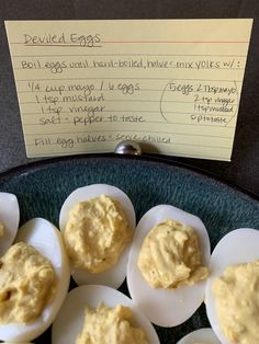 deviled eggs on a plate next to a note that says deviled eggs are hard boiled