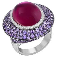 Ring 18K (Matching Earrings Available) Diamond 66-Round 57-0,41-4/6A Diamond 54-Round 57-0,19-4/6A Tourmaline 1-Oval-18,16ct Purple Sapphire 202-7,38 ct Size 7.5 USA NATKINA embraces the principles of modern Feminism — meaning, we believe a woman’s virtue is more than her external beauty. We believe that women deserve to feel proud of their achievements and should commemorate those achievements accordingly, be they a CEO, an Economist, a Designer or a new Mother. We believe that every single day Luxury Ruby Ring With Gemstone Accents, Luxury Amethyst Cabochon Ring For Formal Occasions, Luxury Formal Cabochon Amethyst Ring, Luxury Formal Amethyst Cabochon Ring, Luxury Purple Platinum Rings, Luxury Round Cabochon Amethyst Ring, Luxury White Gold Amethyst Ring With Gemstone Accents, Luxury Purple Cabochon Amethyst Ring, Luxury Purple Amethyst Cabochon Ring