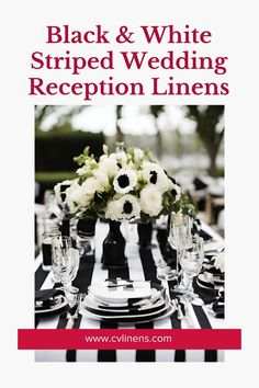 black and white striped wedding reception linens with flowers in vase on the center table