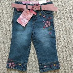 Paris Blues Capri Length Denim Pants With Embroidered Flowers With Buttons Sewn On In Glorious Detail. Comes With Pink Belt. Adjustable Waist. Cute Embroidered Spring Jeans, Cute Embroidered Blue Jeans, Cute Spring Denim Pants, Cute Blue Embroidered Jeans, Cute Embroidered Denim Bottoms, Cute Pink Denim Jeans, 70s Girl, Blue Y2k, Flower Jeans