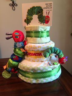 the very hungry caterpillars are stacked on top of each other in this diaper cake