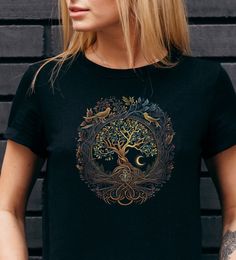 Embrace the intricate dance of nature and spirituality with our Tree of Life and Flower of Life fusion shirt. A treasure for every woman's wardrobe. 🌟 UNISEX T-SHIRT deets: 🌟 💯% ring-spun cotton 😍 Fabric weight: 4.2 oz/y² (142 g/m²) 🏋️♀️ Shoulder-to-shoulder taping for added comfort 🤗 Dual side seams keep the garment's shape longer! 🔄 🌀 WASHING & CARE instructions 🌀 Machine wash cold 🥶, inside-out, on a gentle cycle with mild detergent and similar colors. Use non-chlorine bleach only when needed 🌈. Skip the fabric softeners, please! Tumble dry low or hang-dry for maximum life 🌬️. Cool iron inside-out if required, but keep it away from the decoration 🚫. Dry cleaning is a no-go ❌. 📦 PACKAGING 📦 Your garments are professionally folded and snugly inserted into self-sealing poly Floral Tree, Yoga And Meditation, Open Arms, Poly Mailers, Flower Of Life, Patterns In Nature, Women's Wardrobe, Fabric Softener, Sacred Geometry