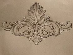 a drawing of an ornate design on a piece of paper