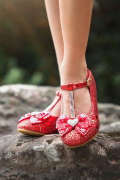 Every girls needs that adorable red shoe and this one will not disappoint! The perfectly placed bows are filled with jeweled hearts, all the way back to the heel. Jeweled straps and a velcro closure make these shoes easy for little fingers to take on and off. Super comfy for tender little feet, she will be dancing around in a twirl! These are darling with so many of our dress up! Shoes For Christmas, Bianca Dress, Faux Fur Wrap, Heart Shoes, Girls Boutique Clothing, Reversible Dress, Girls Dress Up, Princess Shoes, Girls Valentines