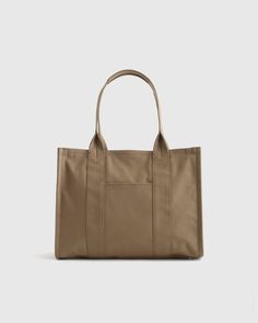 Carhartt East West Tote, Carhartt Legacy East West Tote, Cheap Casual Tote Baguette Bag, Cheap Chic Tote Baguette Bag, Levis Canvas Tote Bag, Cheap Tote Bags For Daily Use, Cheap School Weekender Tote Bag, Affordable Lightweight Versatile Bag, Cheap Versatile Tote Baguette Bag