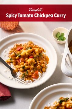 two white plates topped with chicken curry and rice