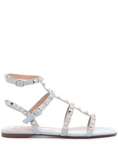 light blue calf leather smooth grain gold-tone Rockstud embellishment square open toe T-bar strap buckle-fastening ankle strap branded leather footbed flat leather sole This piece comes complete with a protective dust bag. Valentino Garavani Shoes, Denim Skirt Women, Leather Sandals Flat, Valentino Women, Valentino Rockstud, Iconic Bags, Skirt Women, Blue Sandals, Flat Boots