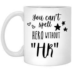 a white coffee mug with the words you can't spell hero without it