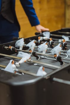 the birds are sitting on top of the trays and ready to be put into the oven