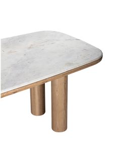 a white marble table with wooden legs