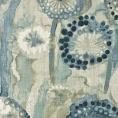 an abstract blue and white design on fabric