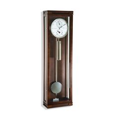 a grandfather clock with pendulum on the wall