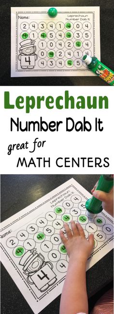 a child's hand is on top of a printable math center with the words leprechaun number dab it