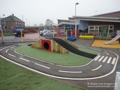 an outdoor play area at a children's park