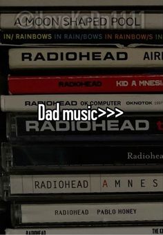 a stack of cds with the words bad music on them