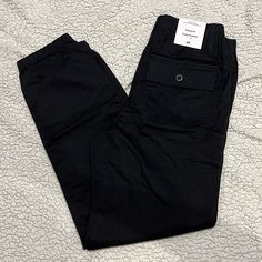 Nwt H&M Black Cargo Pants Mens Xs 2 Pockets In The Front 2 Button Pockets In The Back Casual Black Cargo Pants With Patch Pockets, Black Utility Pants With Welt Pockets, Black Utility Bottoms With Welt Pockets, Urban Black Pants With Patch Pockets, Black Workwear Bottoms With Patch Pockets, Black Utility Tapered Leg Pants, Black Tapered Leg Utility Pants, Urban Black Bottoms With Patch Pockets, Utility Pants With Welt Pockets For Streetwear