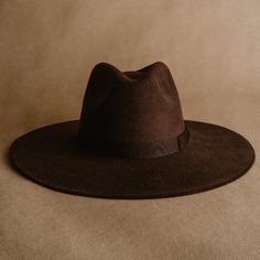 "Looking for a hat that will help you stand out from the crowd? Check out the Brown Felt Fedora Hat. This eye-catching hat is handmade in México from wool to felt, and features a 10 centimeter wide brim. The elegant brown color is perfect for any outfit, and the hat can be worn all year round. * Handmade in México * Made from natural materials * 5-star rated model * Etsy's pick: selected by Etsy's style and trend editors SIZES Medium (M) = head circumference of 56 - 58.5cm Large (L) = head circu Brown Felt Hat Outfit, Solid Color Fedora With Curved Brim For Fall, Fall Fedora With Curved Brim, Solid Flat Crown Hat For Fall, Solid Flat Brim Top Hat For Fall, Fall Hat With Curved Brim, Fall Season Brimmed Fedora, Solid Color Curved Brim Hat For Fall, Winter Wide Brim Fedora