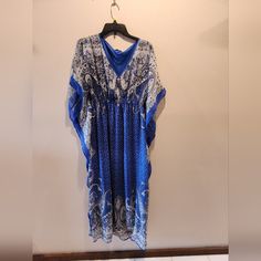 I Love The Easy Breezy Look Of This Gorgeous Dress. The Material Is Very Silky Feeling And Wears So Comfortably. Blue Printed Dresses For Daywear, Blue Summer Daywear Kaftan, Summer Blue Kaftan For Daywear, Casual Blue Kaftan For Daywear, Blue Kaftan For Summer Daywear, Blue Kaftan For Daywear In Summer, Casual Blue Free Size Dress, Casual Blue Maxi Dress In Free Size, Casual Blue Maxi Dress One Size Fits All