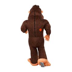 a child in a monkey costume standing on one foot